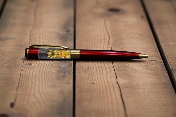 Red Ball Pen with Shree Ram Symbol on Cap – Spiritual Black Ink Pen for Gifting & Daily Use - Image 4